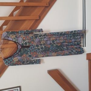 Salaam dress, funky brown tone print, below the knee length.